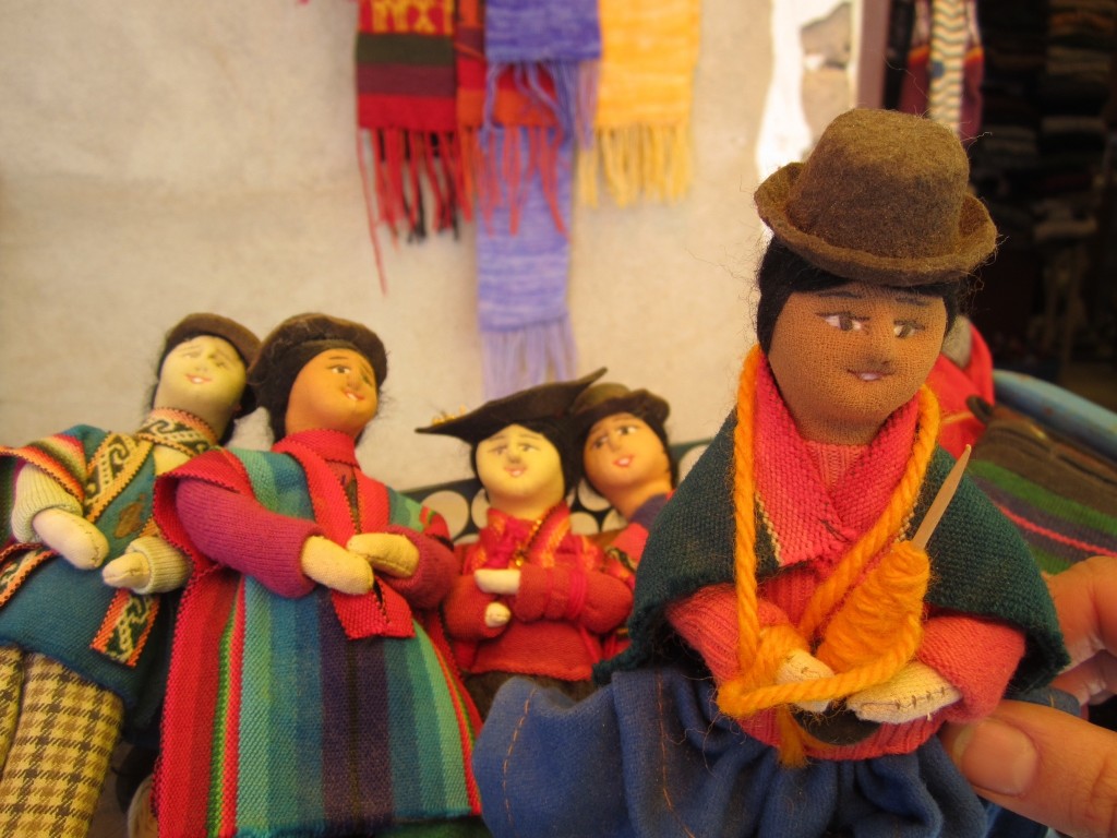 Dolls of women wearing traditional Bolivian clothes