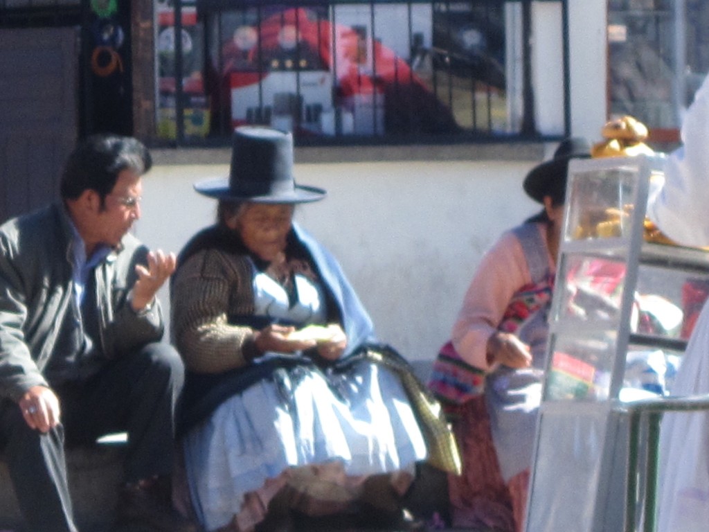 Women gather in the market square in Potosi