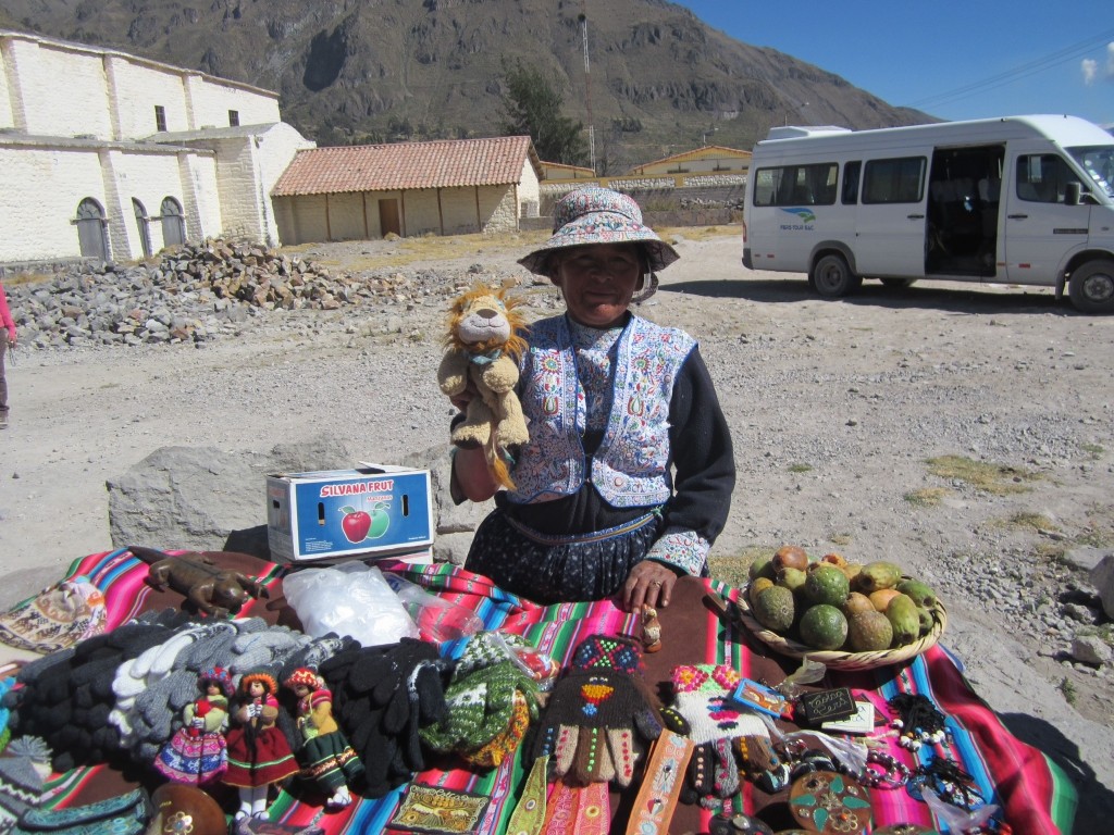 A tradeswoman in Maca says hello to Lewis