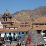 A golden Inca king stands proud in the middle of the square