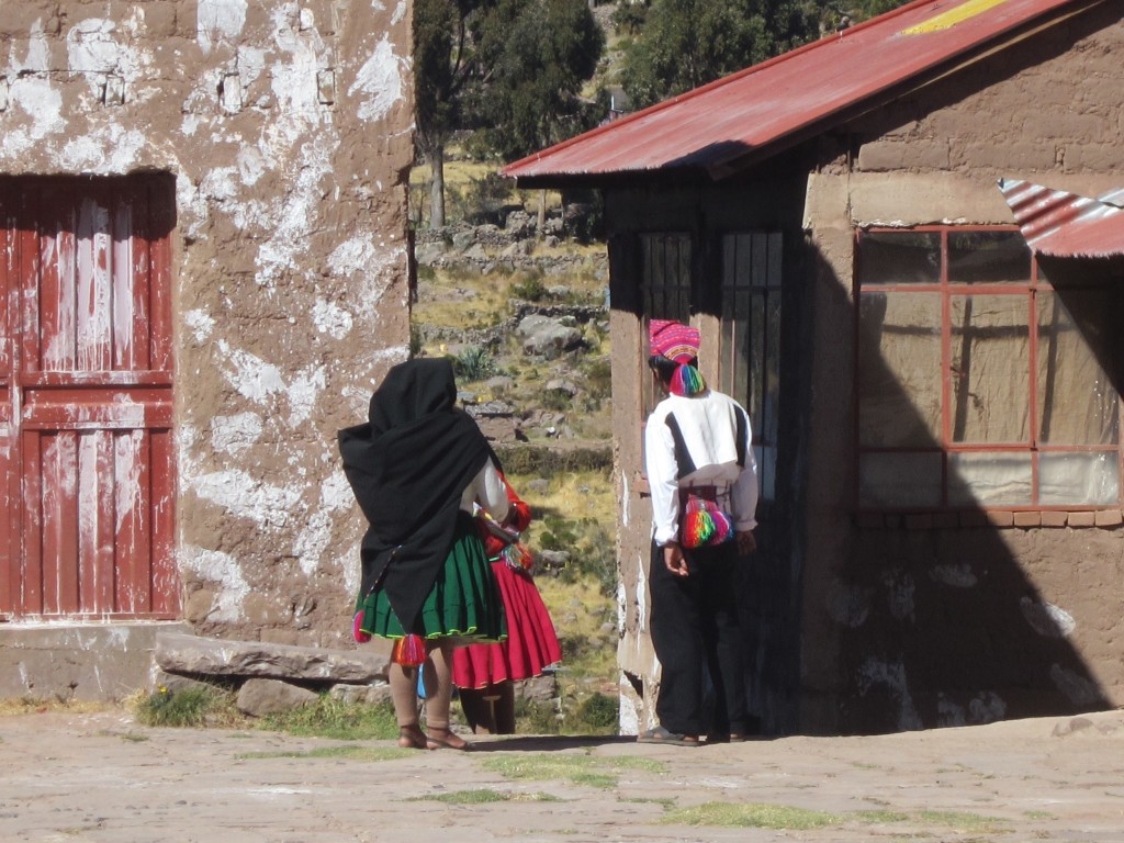 Traditionally dressed Taquile locals