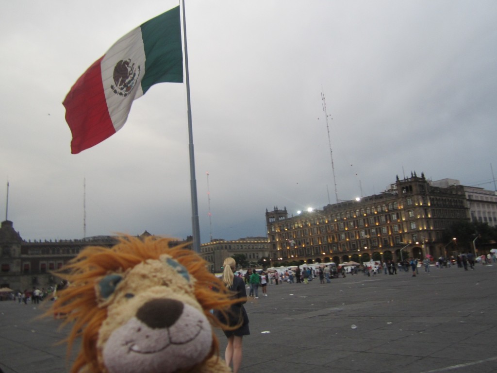 The colossal Mexican flag flaps in the middle of the Zócalo