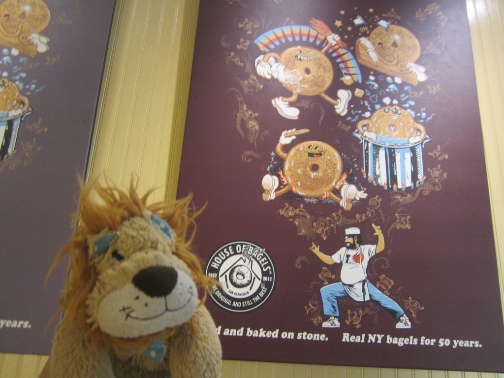 Lewis the Lion laughs at the funny bagel poster