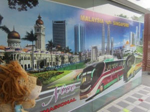 Lewis the Lion catches the Transnasional Bus from Singapore to Malaysia