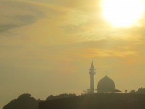 The mosque rings out its melodic morning prayer in Mersing