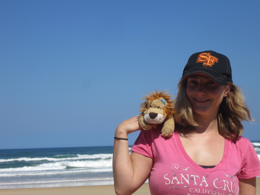 Lewis the Lion rests on Helen's shoulder whilst looking at this idyllic sand island