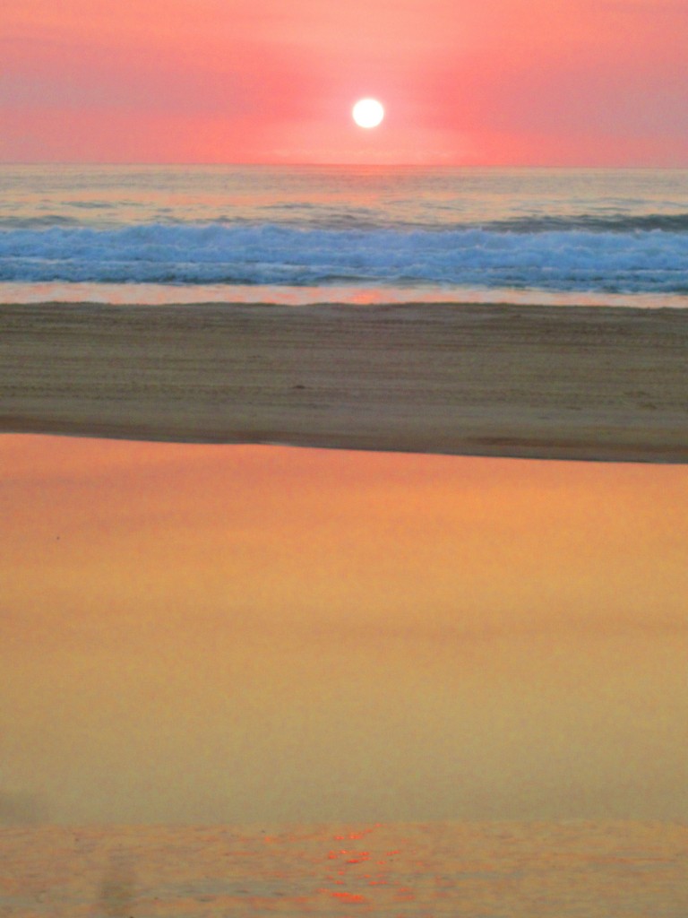 Watching a beautiful sunrise on Fraser Island's beach until...