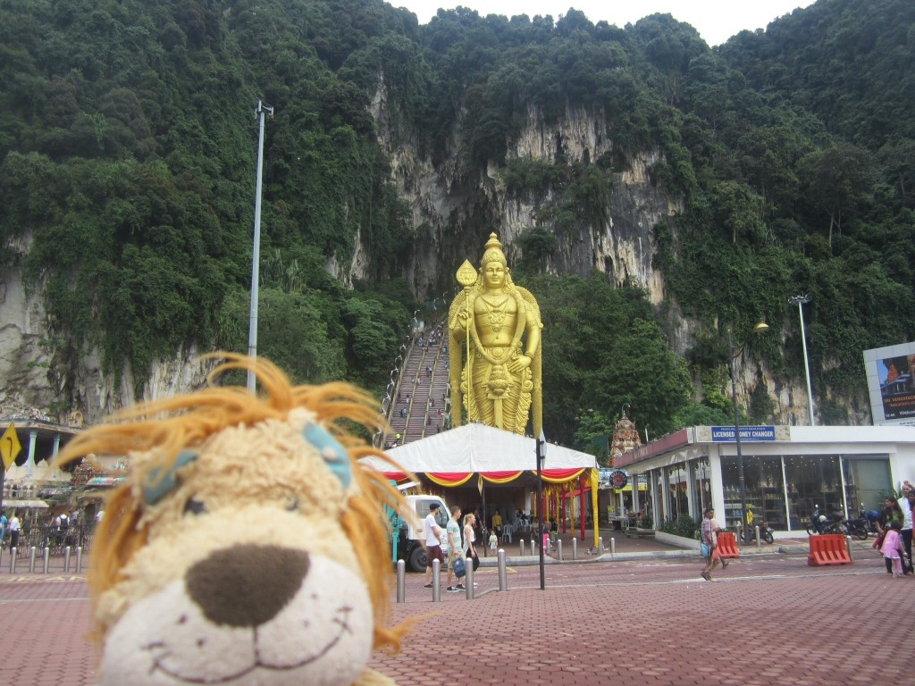 Lewis the Lion gets some perspective on the site of the Batu Caves