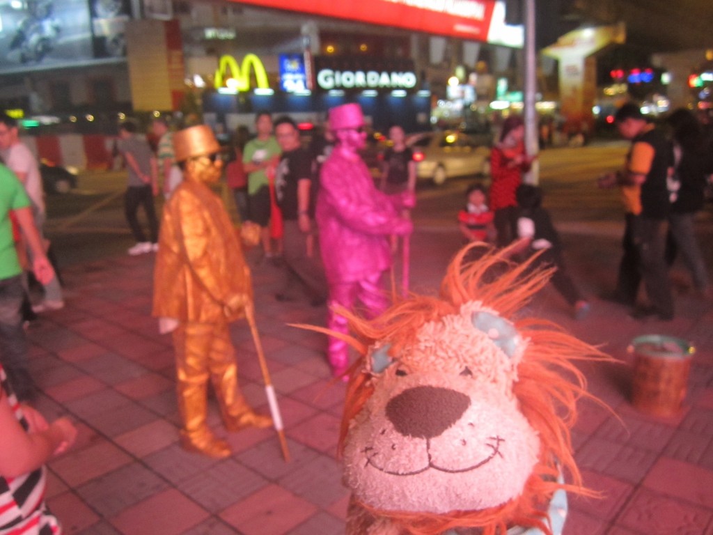 Lewis the Lion enjoys Kuala Lumpur's vibrant street life