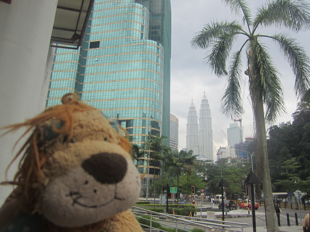 Lewis the Lion sees the Petronas Twin Towers in the distance