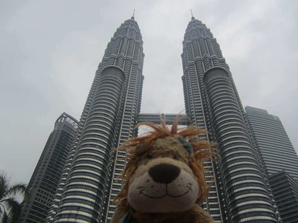 Lewis the Lion at the base of the Malaysian Petronas Towers