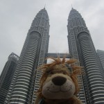 Lewis the Lion at the base of the Malaysian Petronas Towers