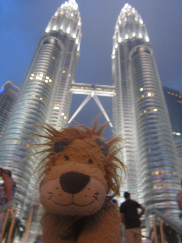 Lewis the Lion admires the way the Petronas Towers are lit up in the evening