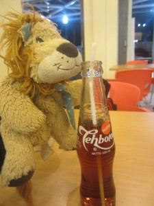 Lewis the Lion tries out an Indonesian soft drink: Tehbotol