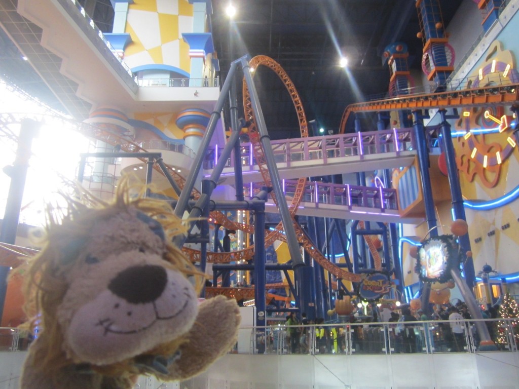 Inside the Times Square shopping mall with its roller coaster