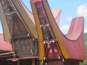 The red roofs have an under-panelling which is patterned with designs of swirls and cockrels