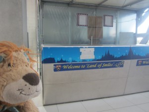 Lewis the Lion smiles to himself as he is welcomed to "The Land of Smiles!"