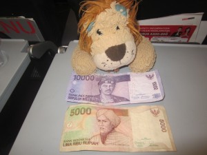 Lewis the Lion can't believe the number of zeroes on these notes!
