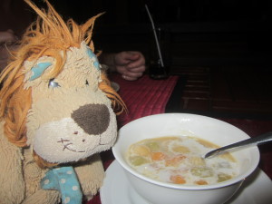 Lewis the Lion tries the sweet and sticky Bua Loi pudding