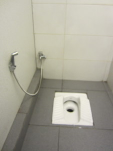 A traditional Asian squat toilet