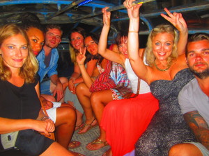 Lewis' friends board a Thai taxi to take them to another part of the island