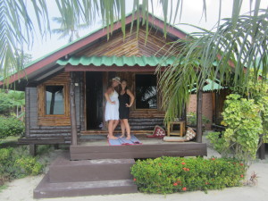 Helen and Sinead stand outside of their beach bungalow