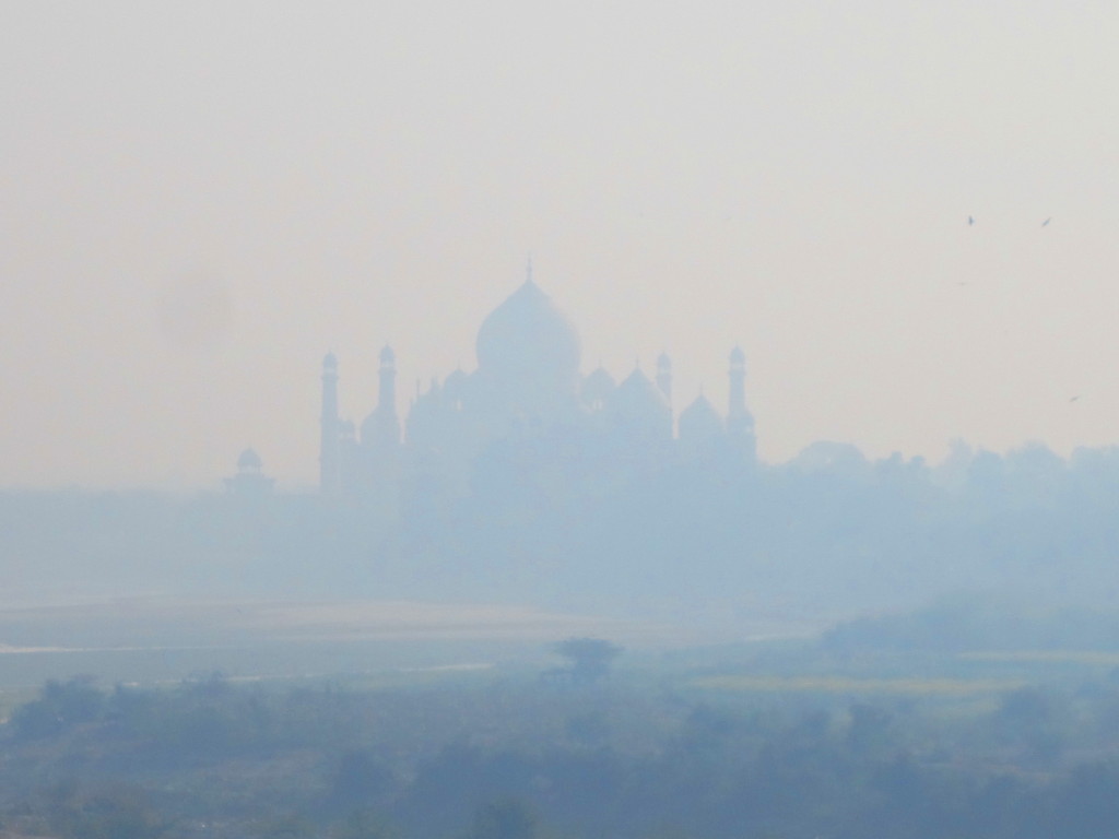 The Taj Mahal silhouetted in the distance