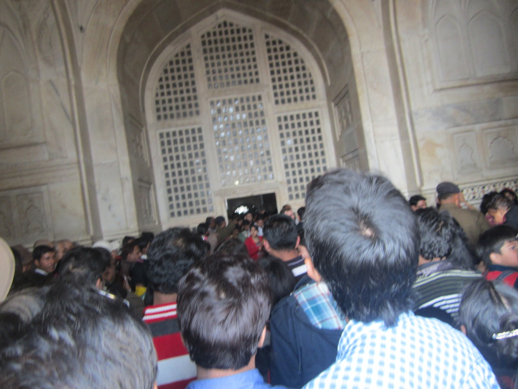 The crowds swarm to enter the Taj Mahal