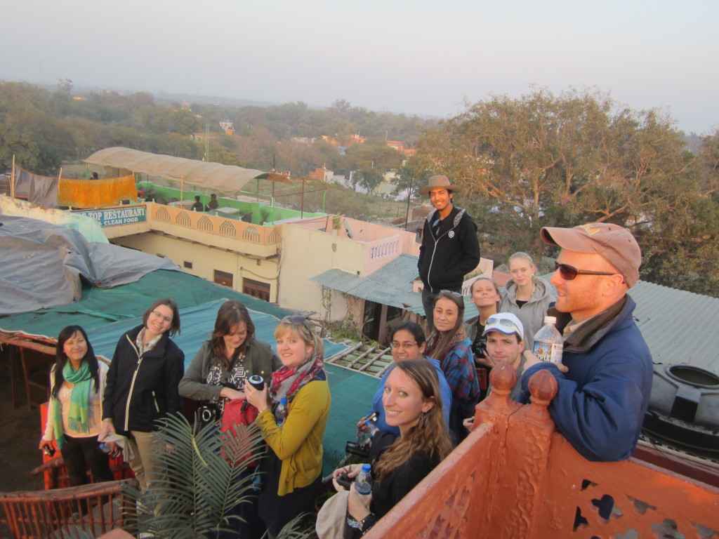 The group admire the view of the Taj Mahal from a cafe rooftop