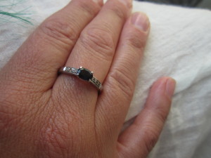 Helen buys a sapphire and diamond ring