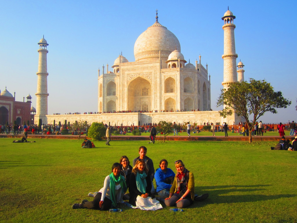 Helen and her friends sit in the Taj Mahal Gardens
