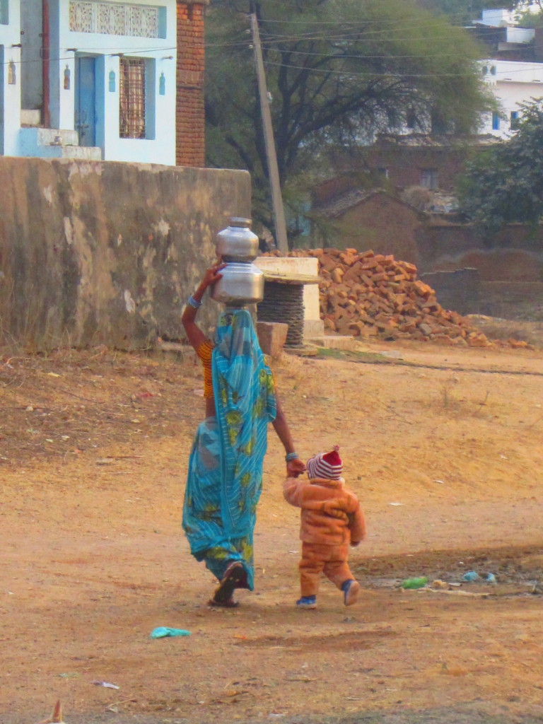 A mother fetching water