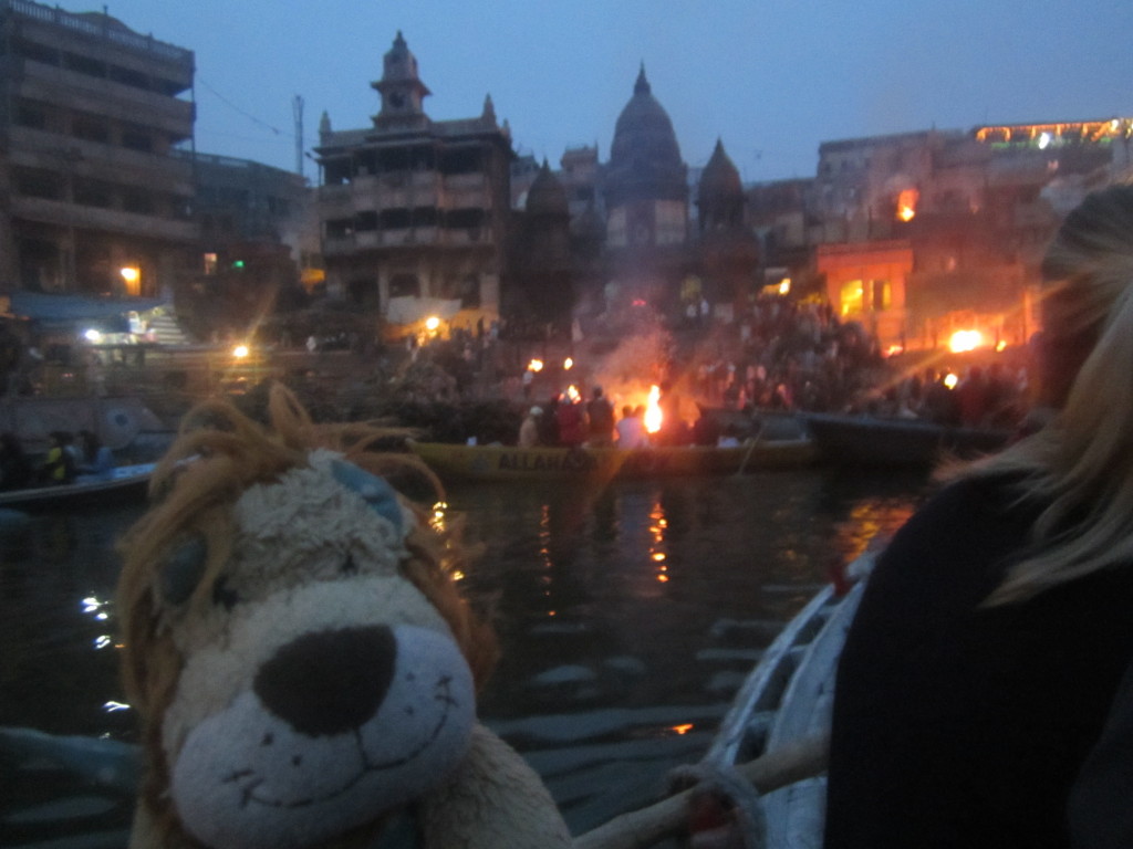 Lewis watches some traditional Indian funeral pyres on the ghats of the River Ganga.