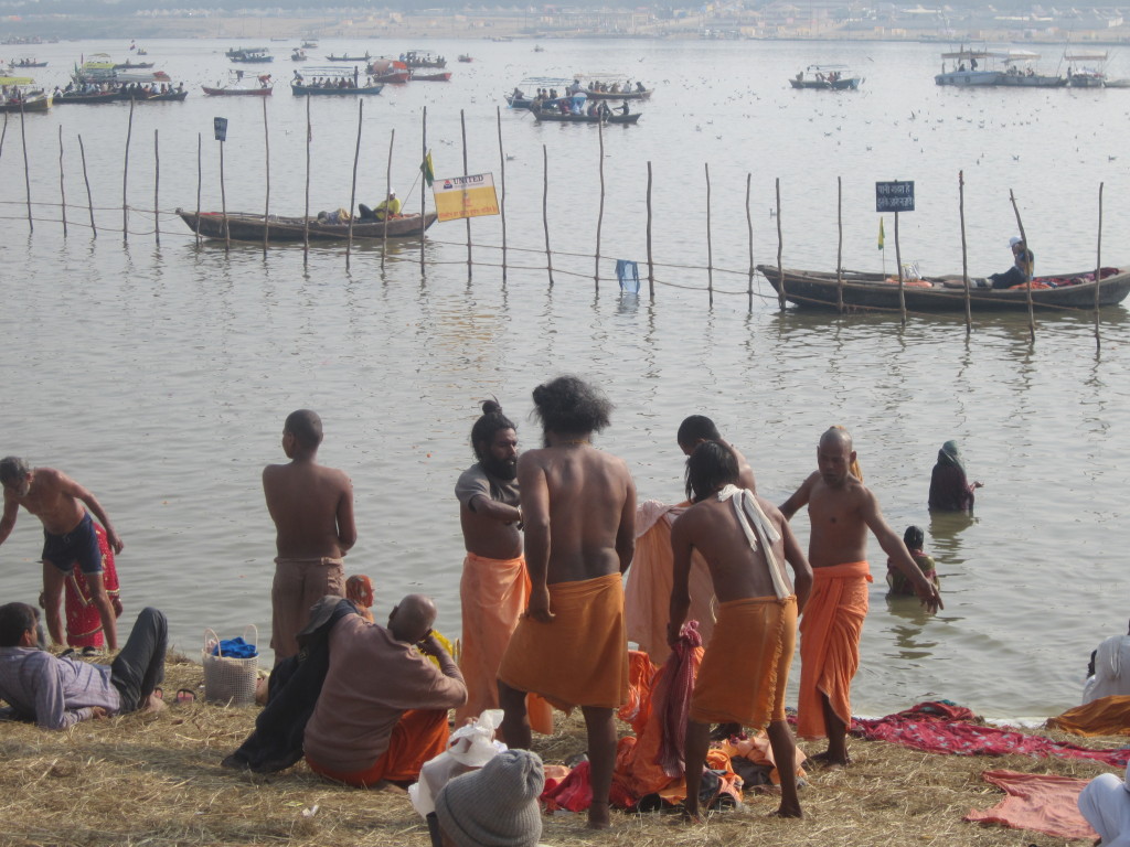 A group of monks prepare to take the dip together